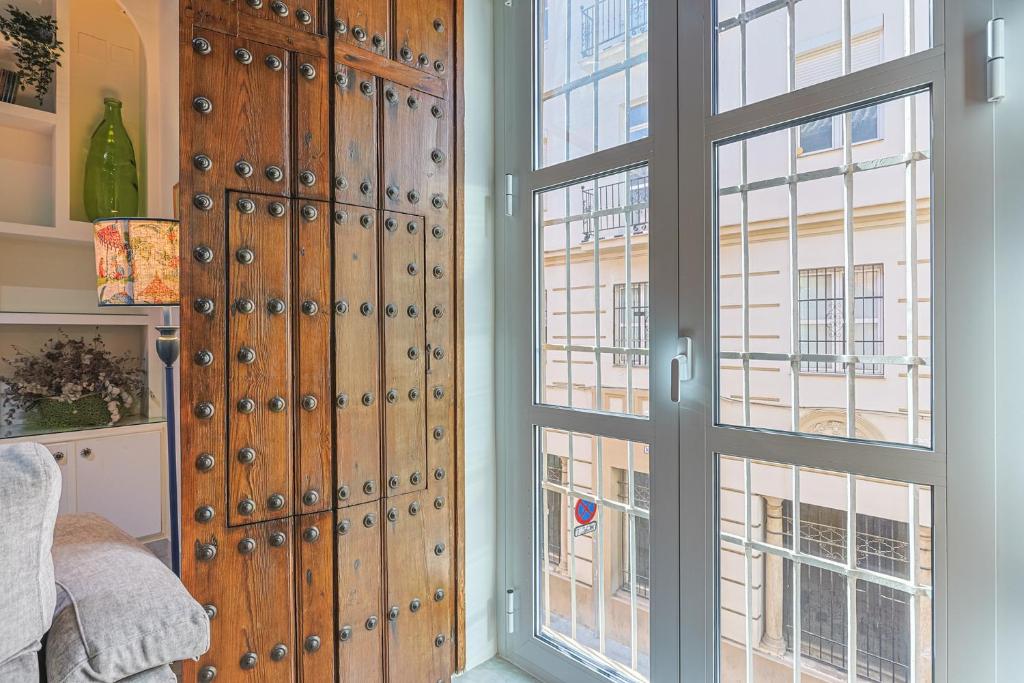 Ένα ή περισσότερα κρεβάτια σε δωμάτιο στο Casa Palacio Guiomar by SHS