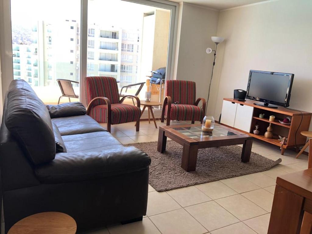 Un televizor și/sau centru de divertisment la Papudo laguna