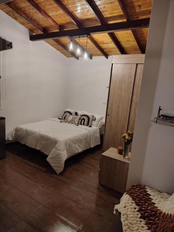 Ένα ή περισσότερα κρεβάτια σε δωμάτιο στο Herencia Colonial Glamping