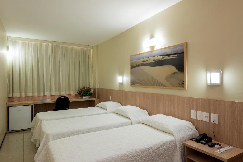 Postel nebo postele na pokoji v ubytování Hotel Express Arrey - Teresina