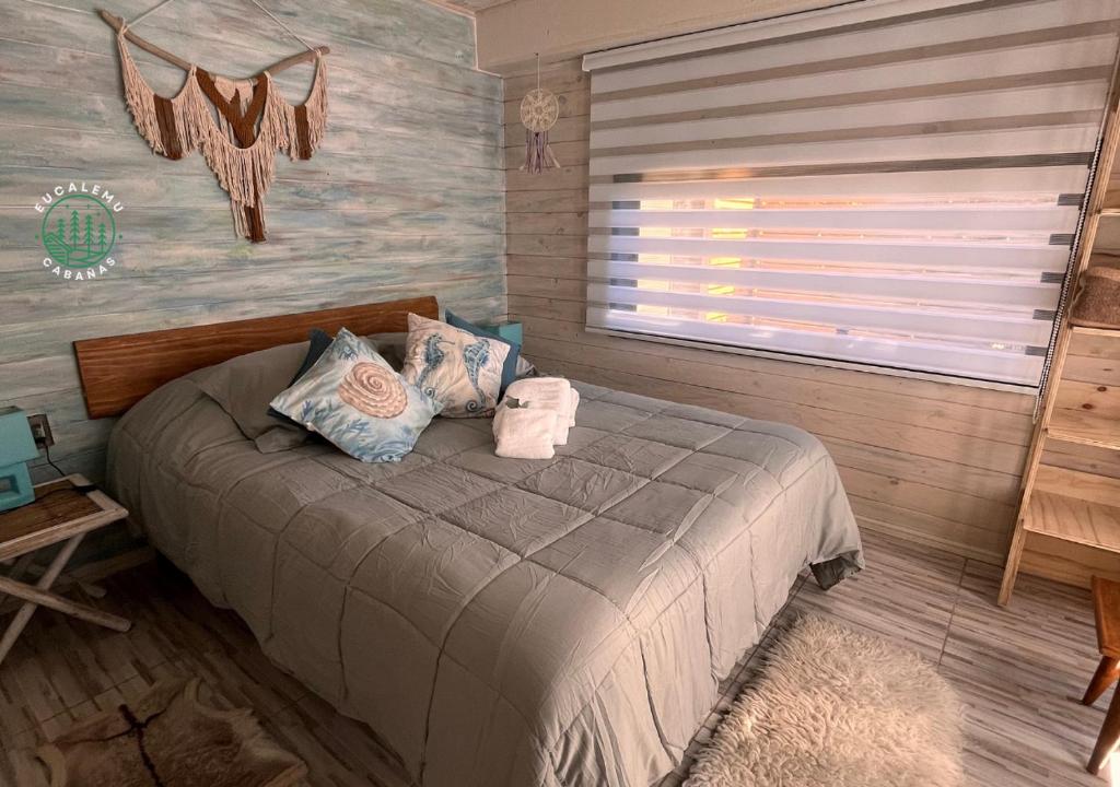 Una cama o camas en una habitación de Eucalemu - Quillay