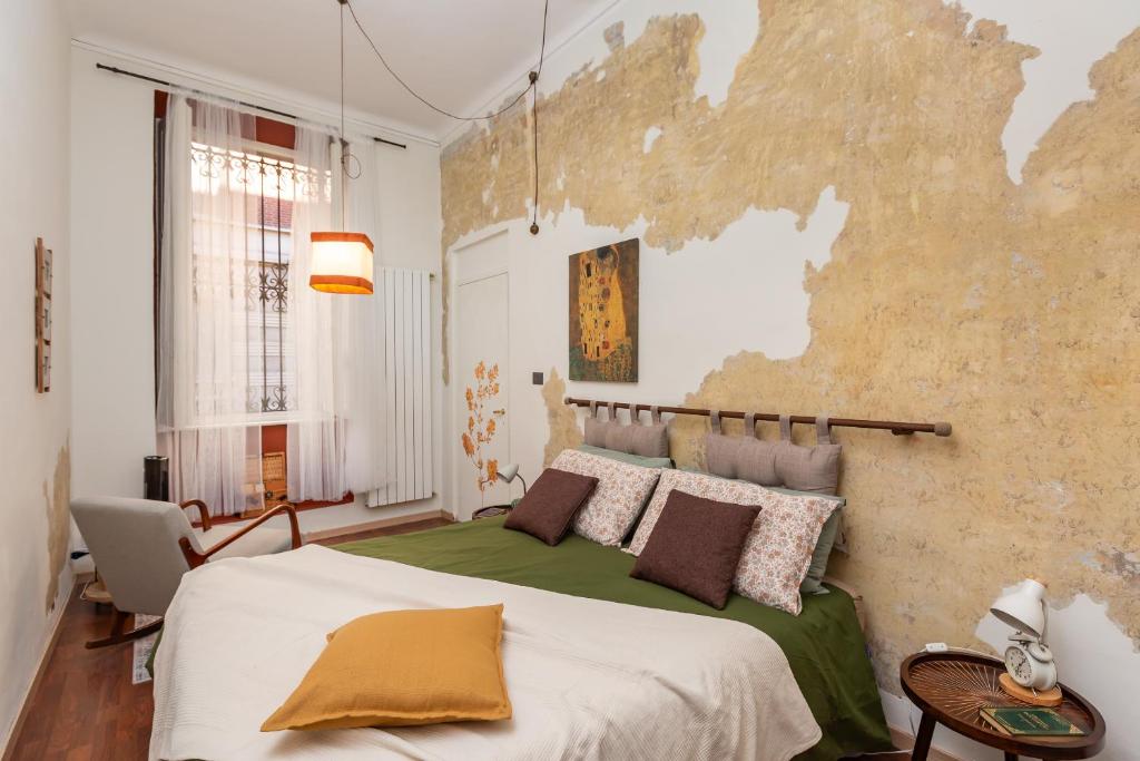 Ένα ή περισσότερα κρεβάτια σε δωμάτιο στο Casa Agnelli eleganza e comfort in zona signorile