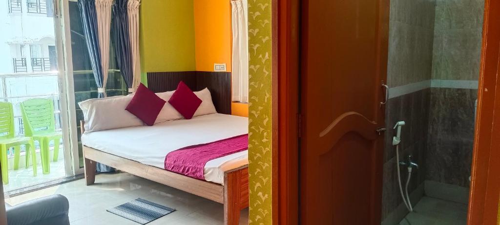 Postel nebo postele na pokoji v ubytování Zeromiles Green Park