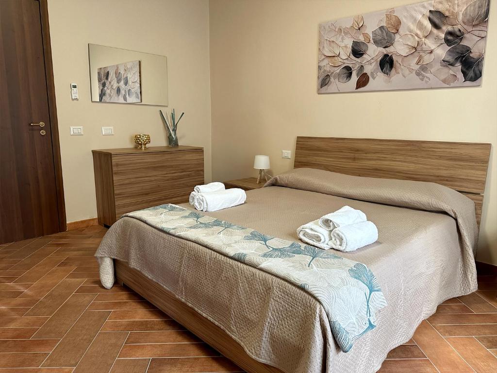 Postel nebo postele na pokoji v ubytování Casa D'Amuri