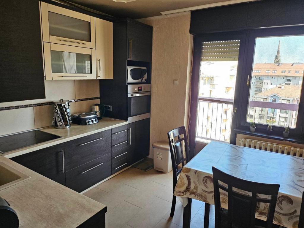 Η κουζίνα ή μικρή κουζίνα στο Apartman Veki