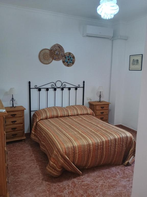 Postel nebo postele na pokoji v ubytování Casa Andalucía