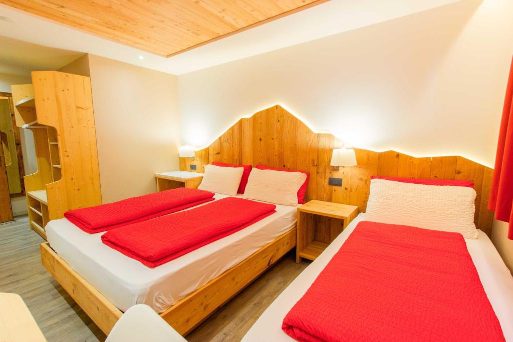 Ένα ή περισσότερα κρεβάτια σε δωμάτιο στο Ampas Francescato