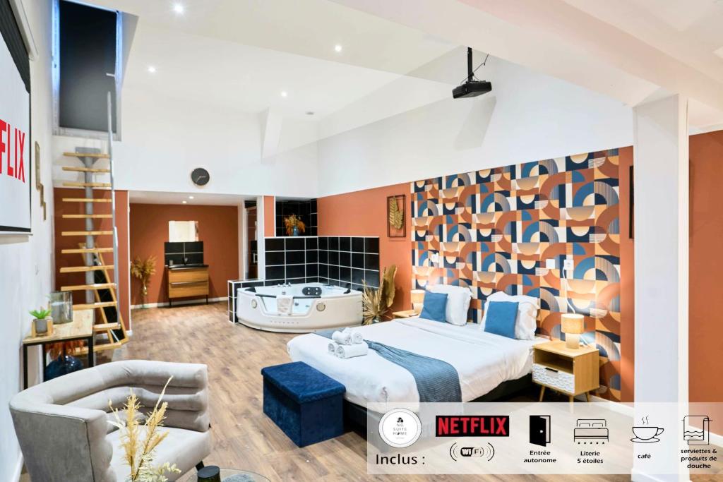 a bedroom with a king sized bed and a couch at NG Prestige - Nain - Suite Spa Privatif - Jacuzzi - Netflix - Projecteur in Roubaix