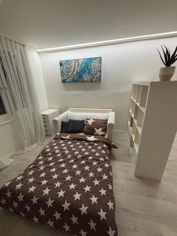 Postel nebo postele na pokoji v ubytování Apartmánový byt VYHNE