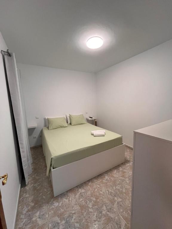 Postel nebo postele na pokoji v ubytování El Cecilio