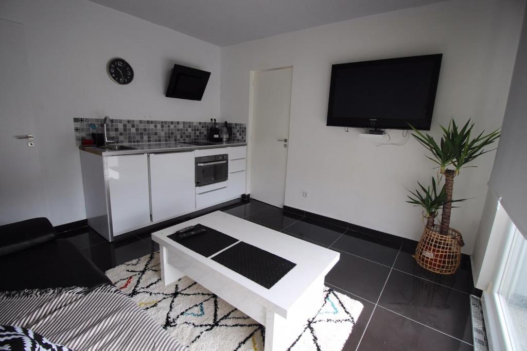 Kuchyň nebo kuchyňský kout v ubytování Cocon douceur