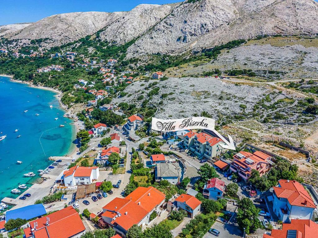 an aerial view of a town next to the ocean at Apartments in Stara Baska - Insel Krk 34433 in Stara Baška