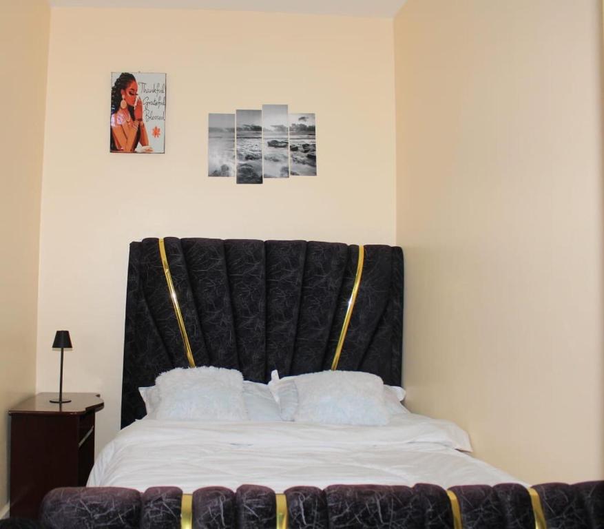 Кровать или кровати в номере Wanjo Cozy Corner