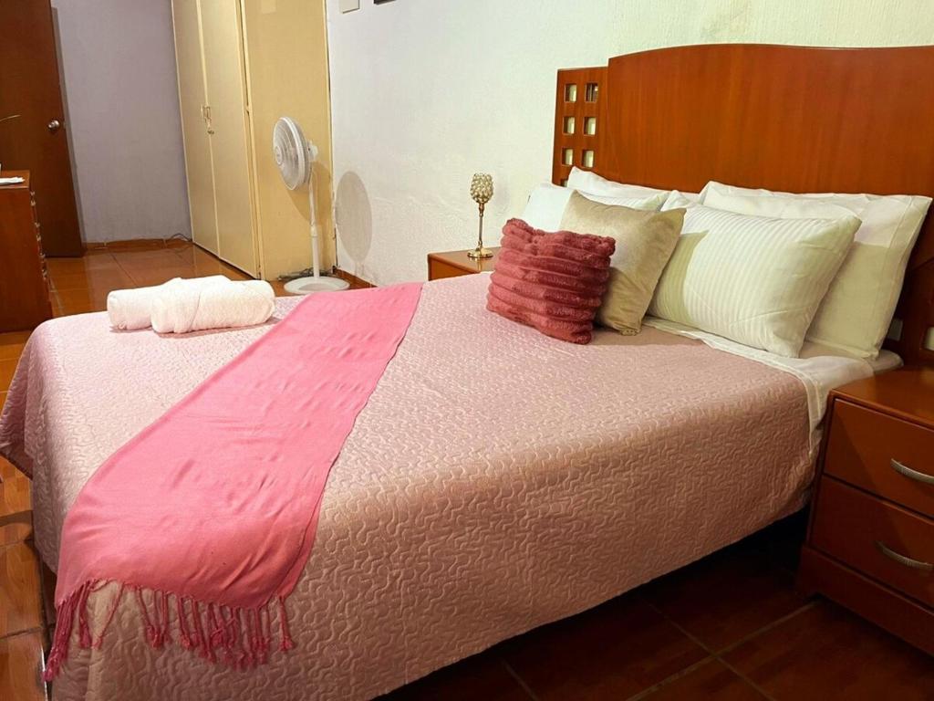 Postel nebo postele na pokoji v ubytování Casa Paraíso, céntrica y con estacionamiento