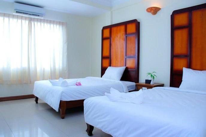 Postel nebo postele na pokoji v ubytování White dream