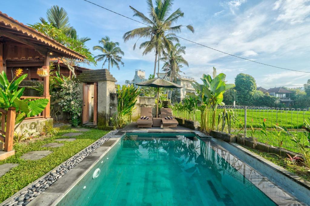 an image of a swimming pool in a villa at Gedong Batu Villas in Ubud