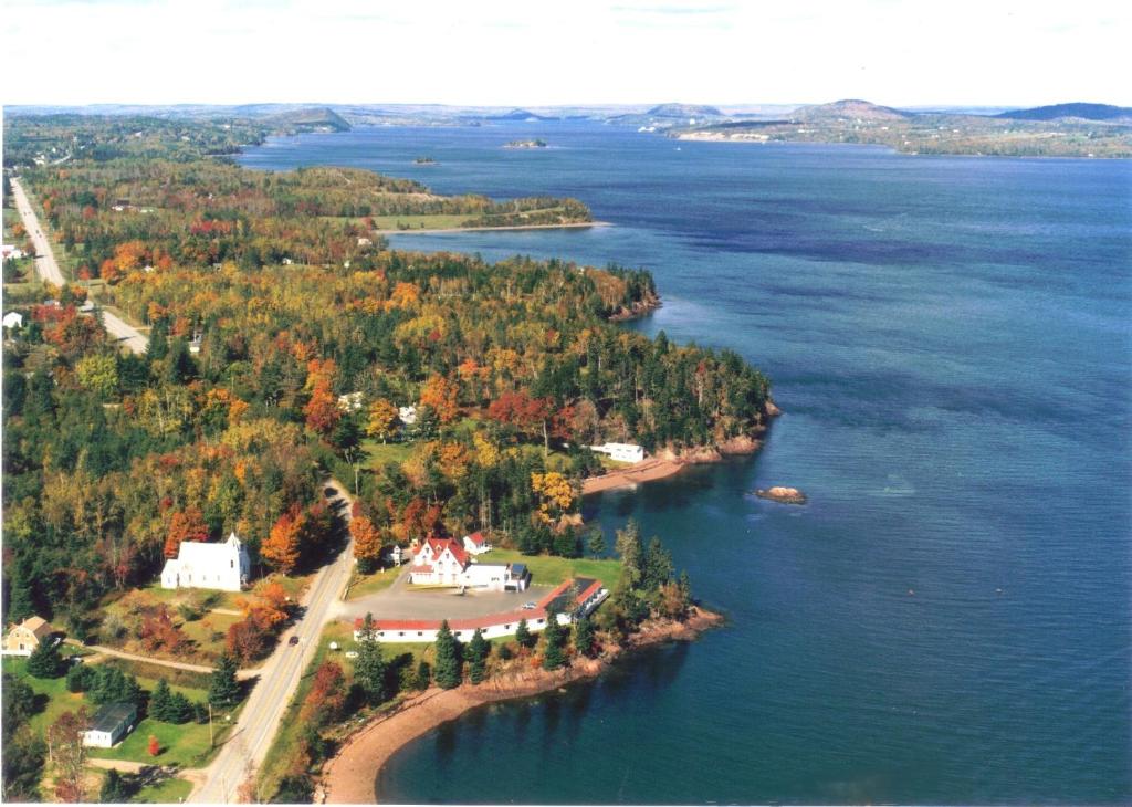 an aerial view of an island in the water at Redclyffe Shore Motor Inn in Robbinston