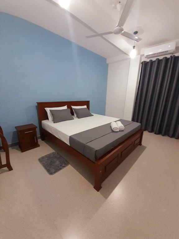 Postel nebo postele na pokoji v ubytování 10 BR Apartments - Galle City