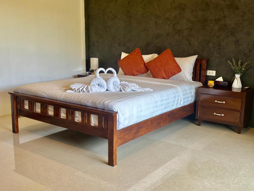 Postel nebo postele na pokoji v ubytování Lanta Feelgood Long beach resort