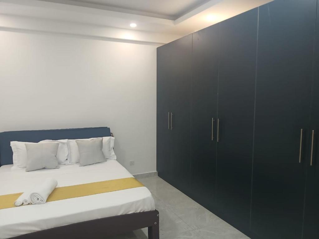 Ένα ή περισσότερα κρεβάτια σε δωμάτιο στο Rbella Haven