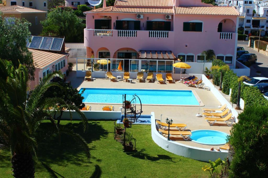 an aerial view of a resort with a swimming pool at Solar de Mos in Lagos