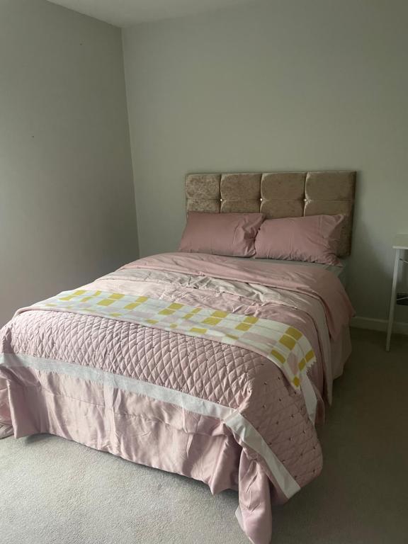 Ένα ή περισσότερα κρεβάτια σε δωμάτιο στο COSY Rooms