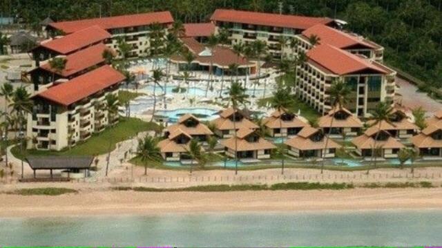 an aerial view of a resort with a swimming pool at Studio Muro Alto in Porto De Galinhas