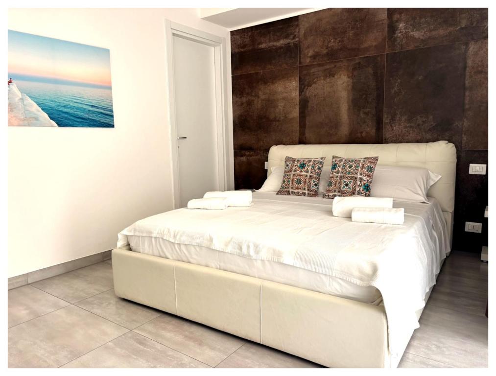 Postel nebo postele na pokoji v ubytování Calipso Suite Room