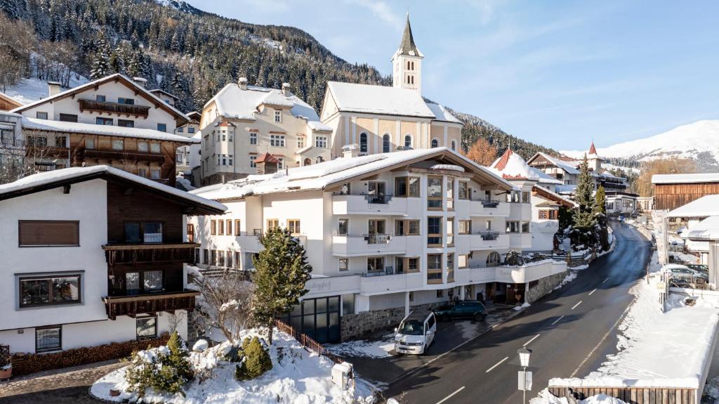 an aerial view of a town in the snow at LAUDEGGHOF Ladis in Ladis