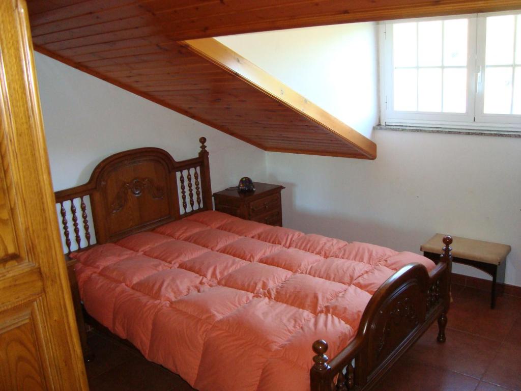 Postel nebo postele na pokoji v ubytování Casa do Xastre