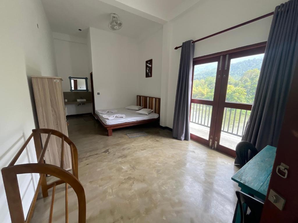 Ένα ή περισσότερα κρεβάτια σε δωμάτιο στο Winland Coffee & Stay