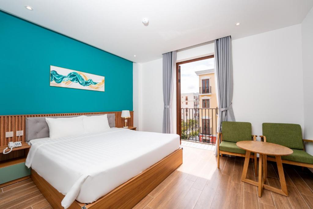 Ένα ή περισσότερα κρεβάτια σε δωμάτιο στο Mimosa Hotel Phú Quốc