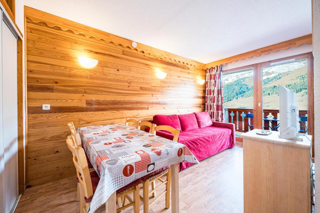 Ένα ή περισσότερα κρεβάτια σε δωμάτιο στο A2 309 Appart au pied des pistes