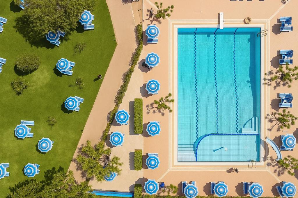 Bazén v ubytování Hotiday Relais Costa degli Etruschi nebo v jeho okolí