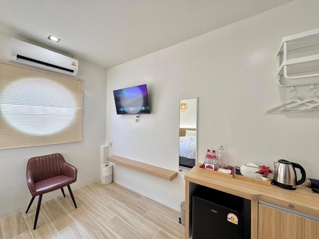 Kuchyň nebo kuchyňský kout v ubytování ปิกรพลอย บูทีค โฮเทล PIKORNPLOY Boutique Hotel