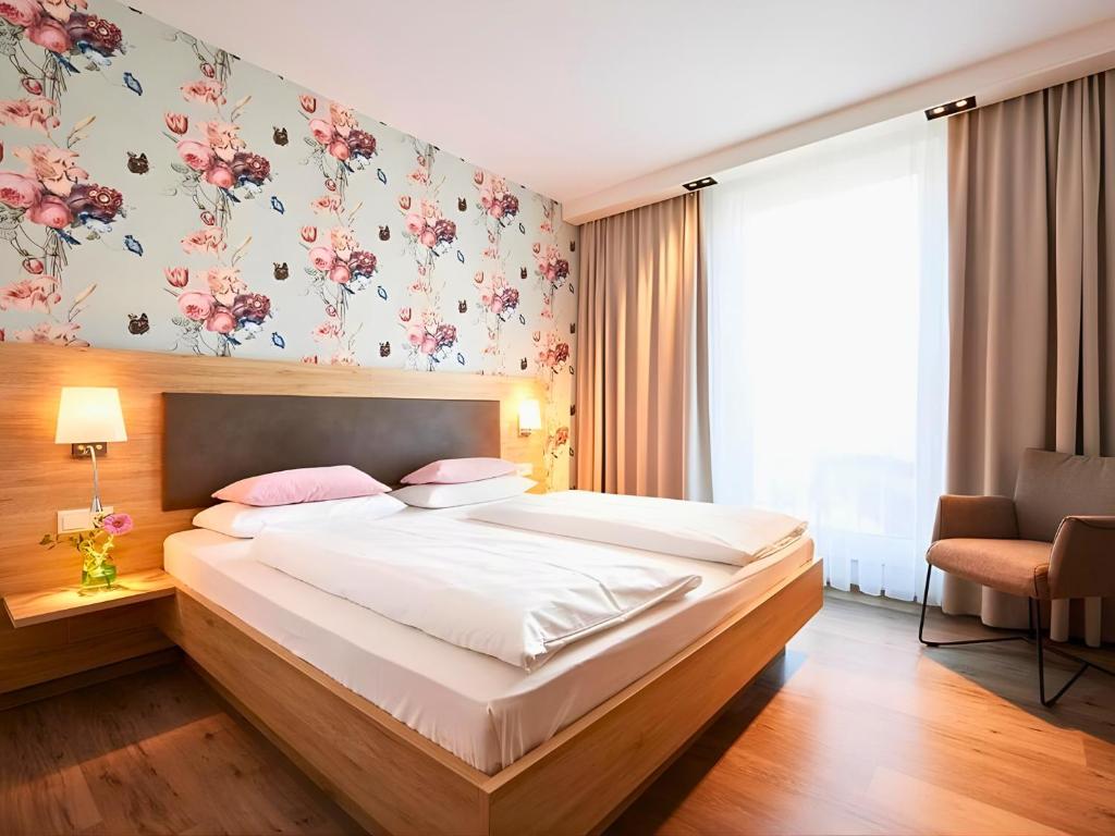 Llit o llits en una habitació de Hotel Sarah