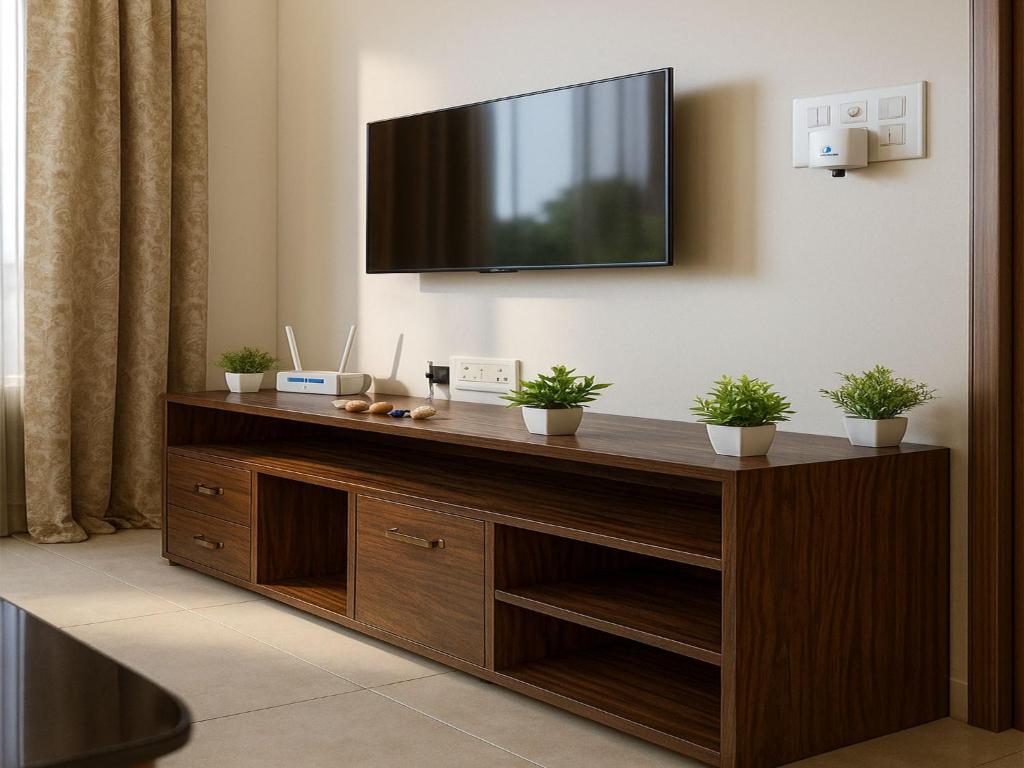 Μια τηλεόραση ή/και κέντρο ψυχαγωγίας στο Stay Royal Villa Bnb Gf