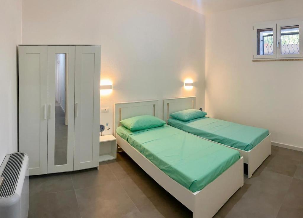 Ένα ή περισσότερα κρεβάτια σε δωμάτιο στο Thilimba Holiday Home