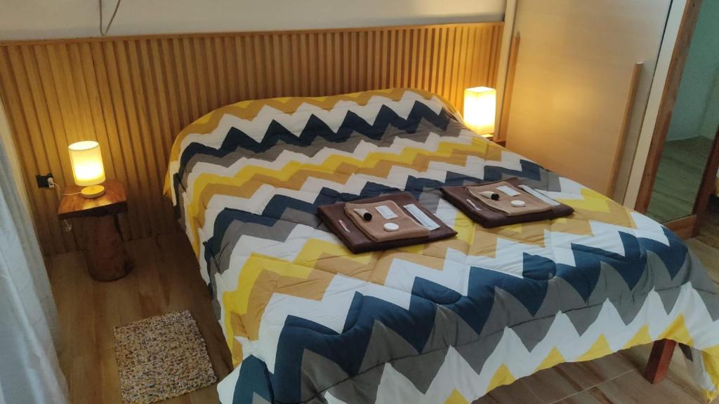 Voodi või voodid majutusasutuse The English Filipina Secret Garden Resort toas