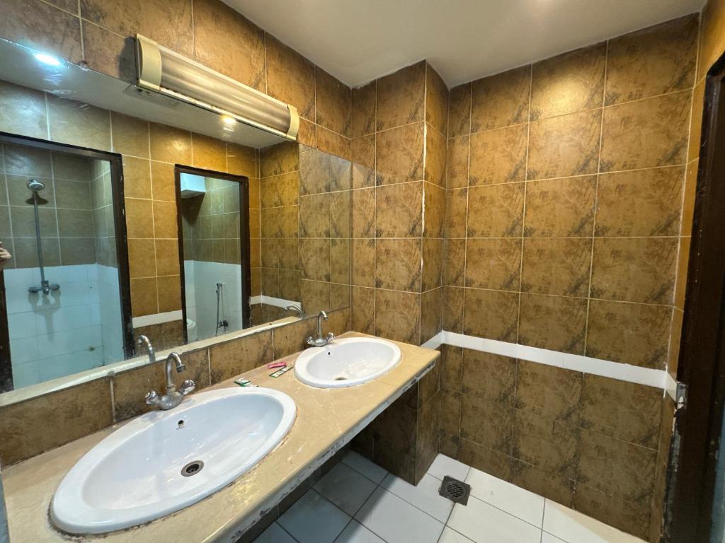 Koupelna v ubytování Hotel Golden Tree