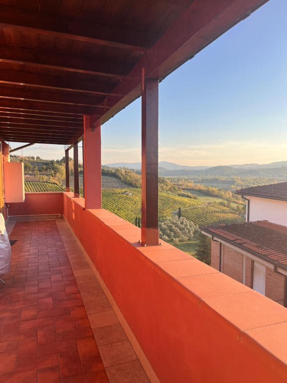 a view from the balcony of a house with a view at Belvedere House Peccioli in Peccioli