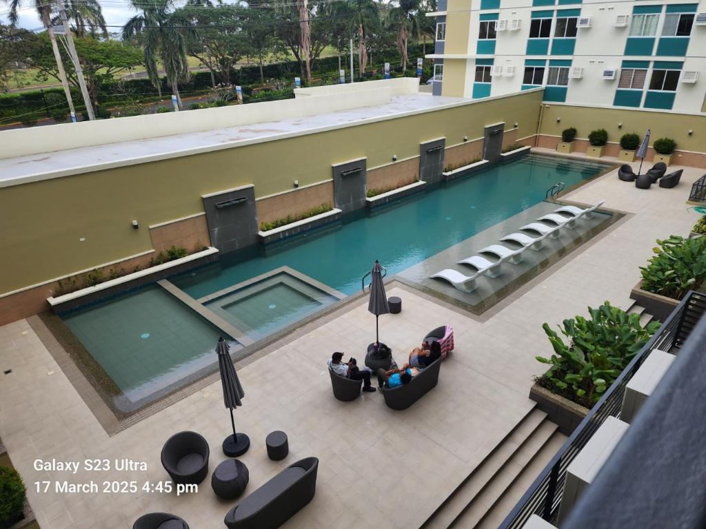 an overhead view of a swimming pool at a hotel at Luna's Place in Sampong