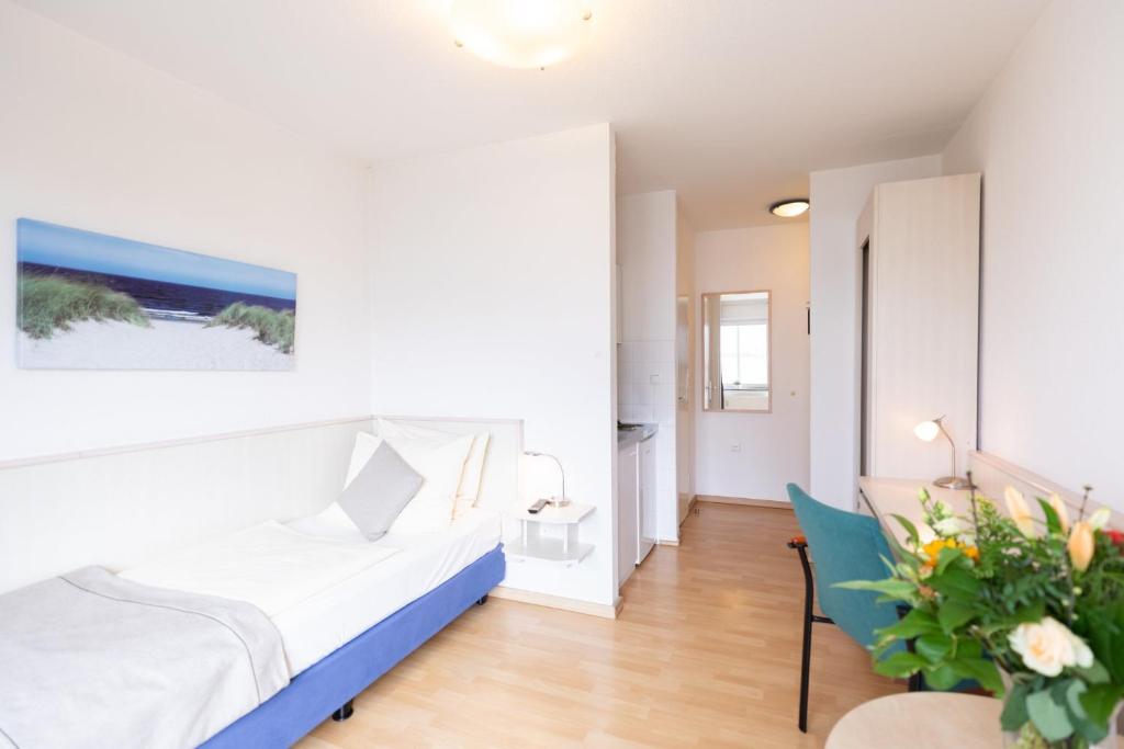 Postel nebo postele na pokoji v ubytování Garner Hotel Bremen North by IHG