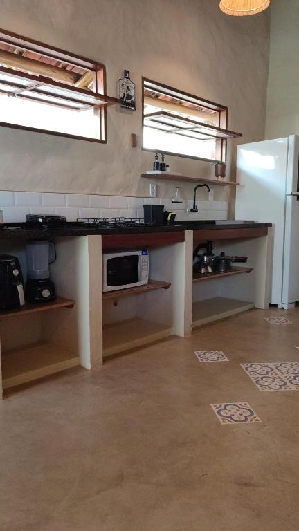 Küche/Küchenzeile in der Unterkunft Casa Colibri - Piscina Privativa - Patacho Lages