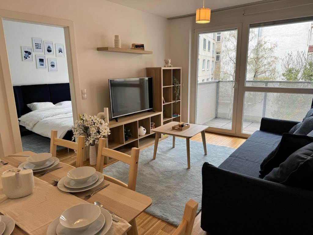 Ένα ή περισσότερα κρεβάτια σε δωμάτιο στο 2BR, balcony, central, danube, U6 & S-Bahn - BRN 22