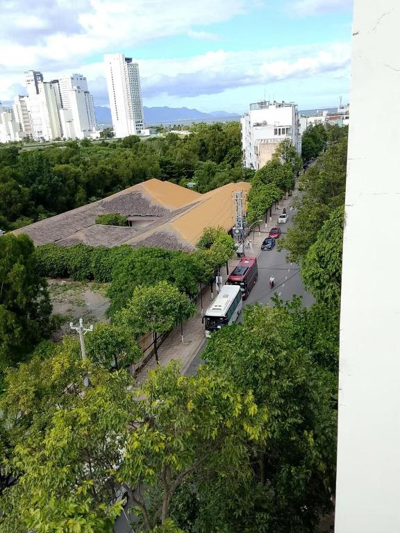 a view of a street with cars parked on the road at SAY HOTEL, Nha Trang in Nha Trang