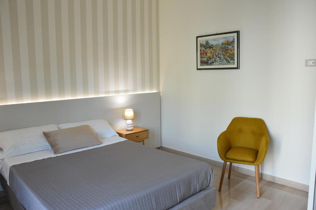 Ένα ή περισσότερα κρεβάτια σε δωμάτιο στο Lux Matera