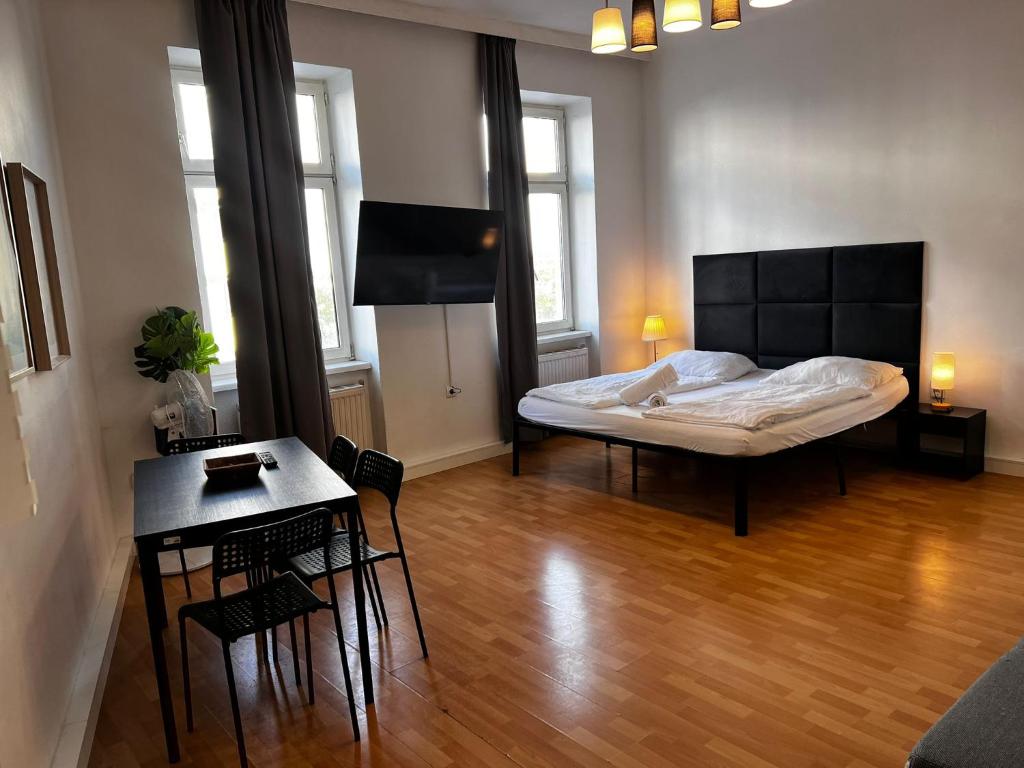 Un ou plusieurs lits dans un hébergement de l'établissement Bright 2BR Apartment in Central Vienna