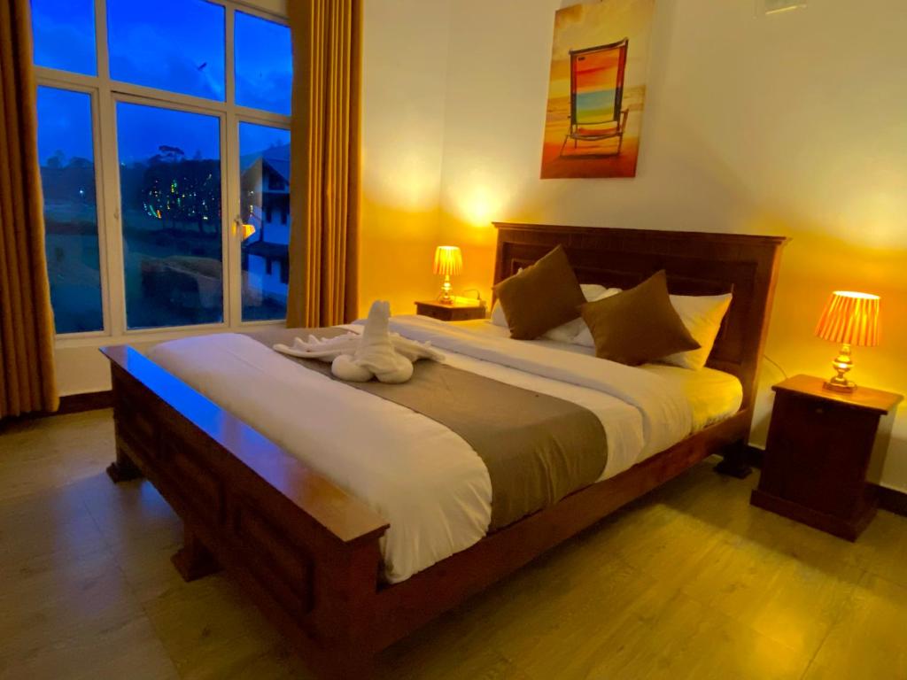 Postel nebo postele na pokoji v ubytování JETCO Lake Front Villa - Nuwara Eliya