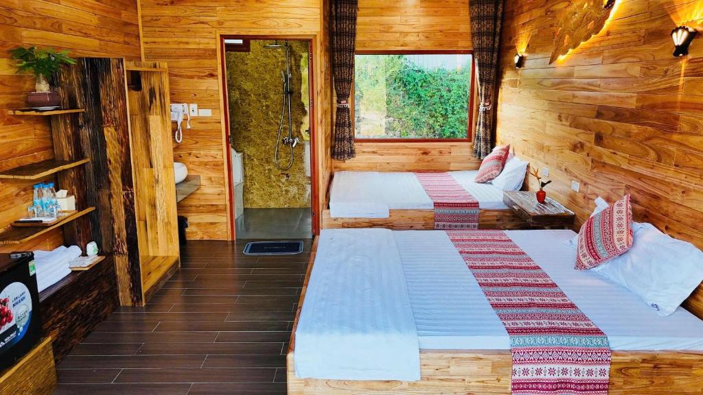 Postel nebo postele na pokoji v ubytování Mely Farm Mường Lò